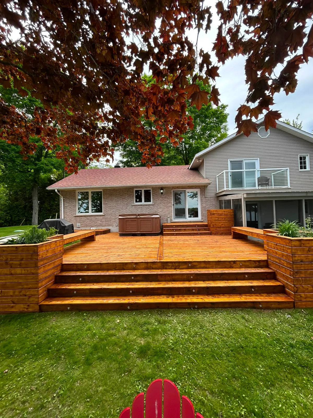 Wide multi-level backyard deck after staining